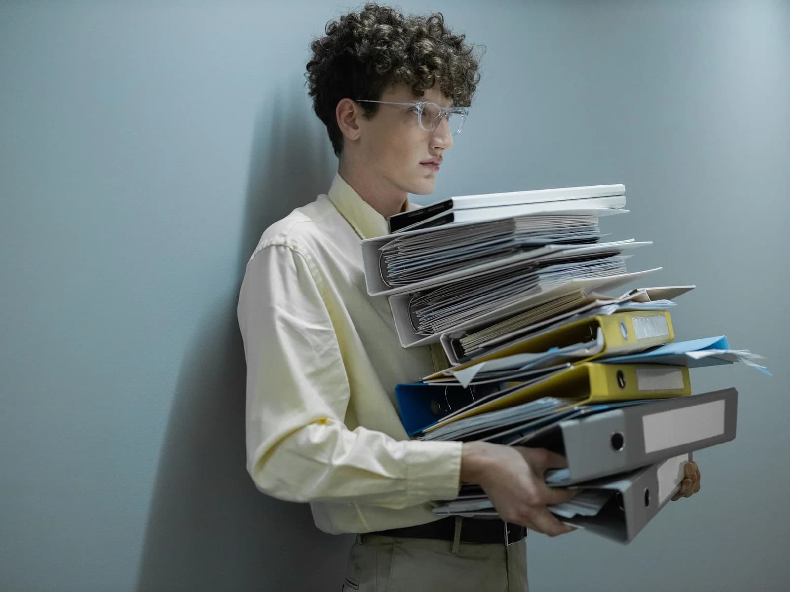 Organized document binders prepared for a handoff