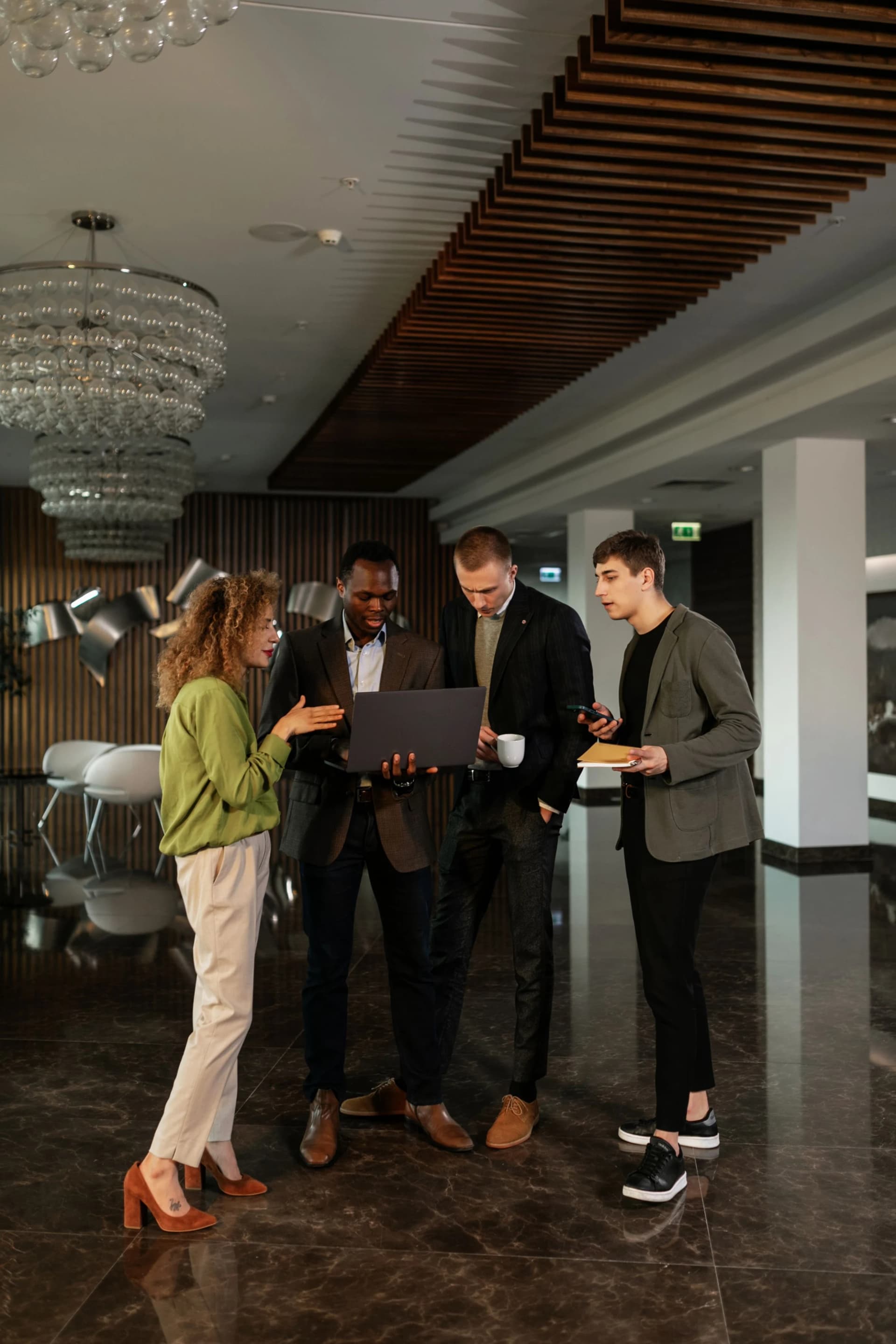 Professionals discussing work in an office